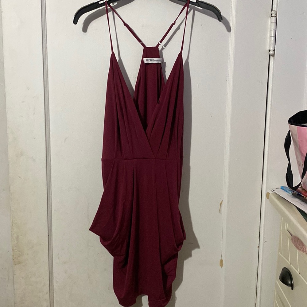 I am selling a Brand New BCBGeneration it’s a Medium dress.